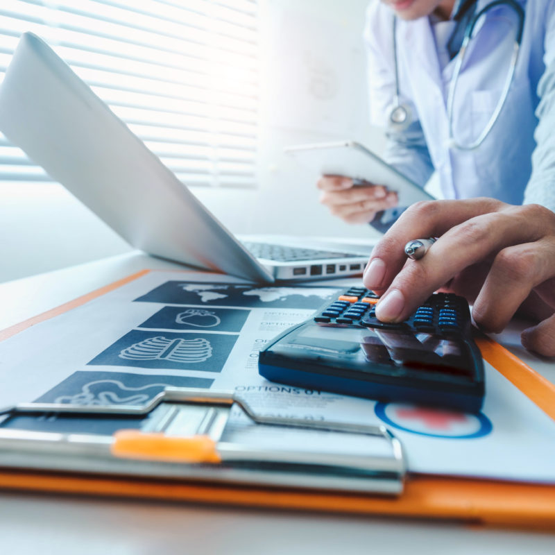 doctor using calculator