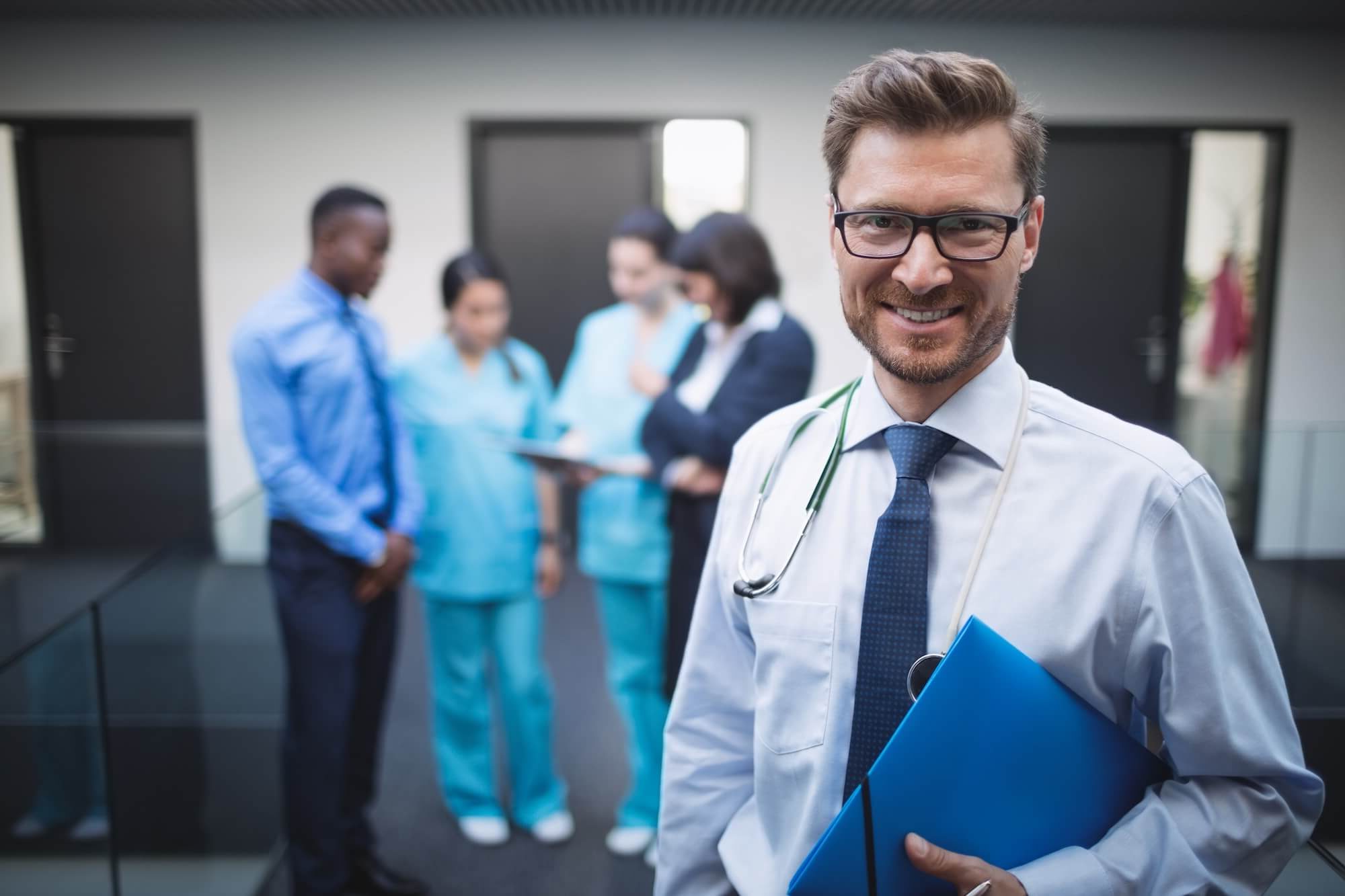 Healthcare provider in hospital corridor